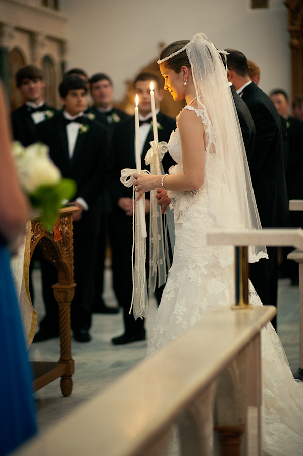 the bride and groom during ceremony ritual - photo by Houston based wedding photographer Adam Nyholt